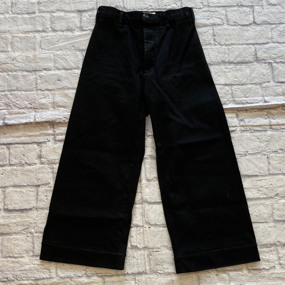 THE GREAT. Classic Black High-Rise Flair Trousers.